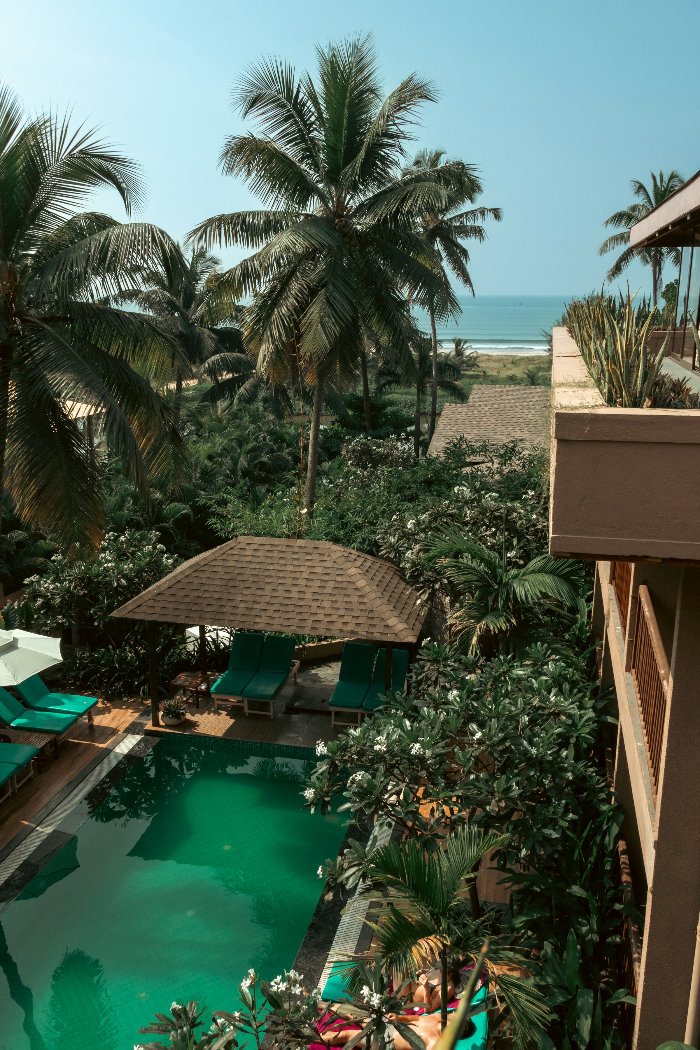 North Goa coastal resort with infinity pool overlooking the Arabian Sea